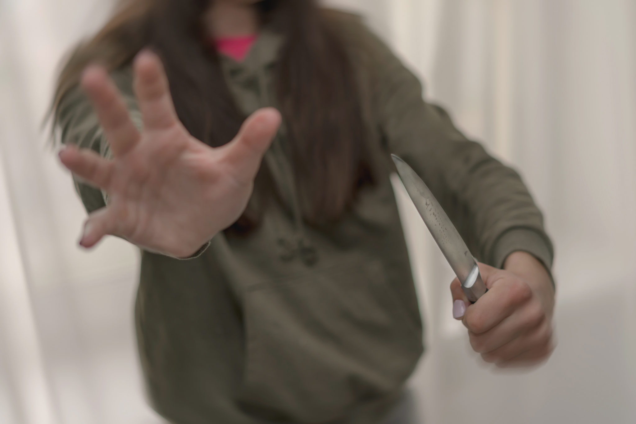 Woman holding a knife