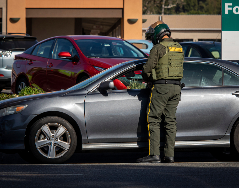 Police officer giving a traffic ticket