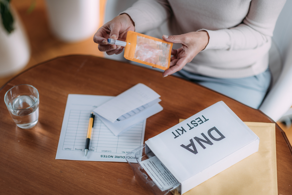 Woman Preparing DNA Genetic Test Kit
