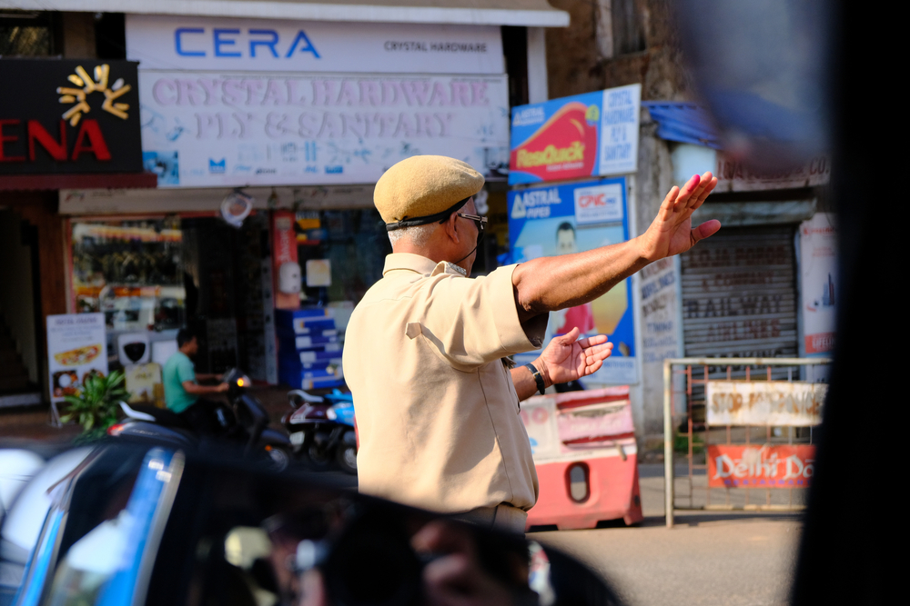Indian policeman controls road traffic
