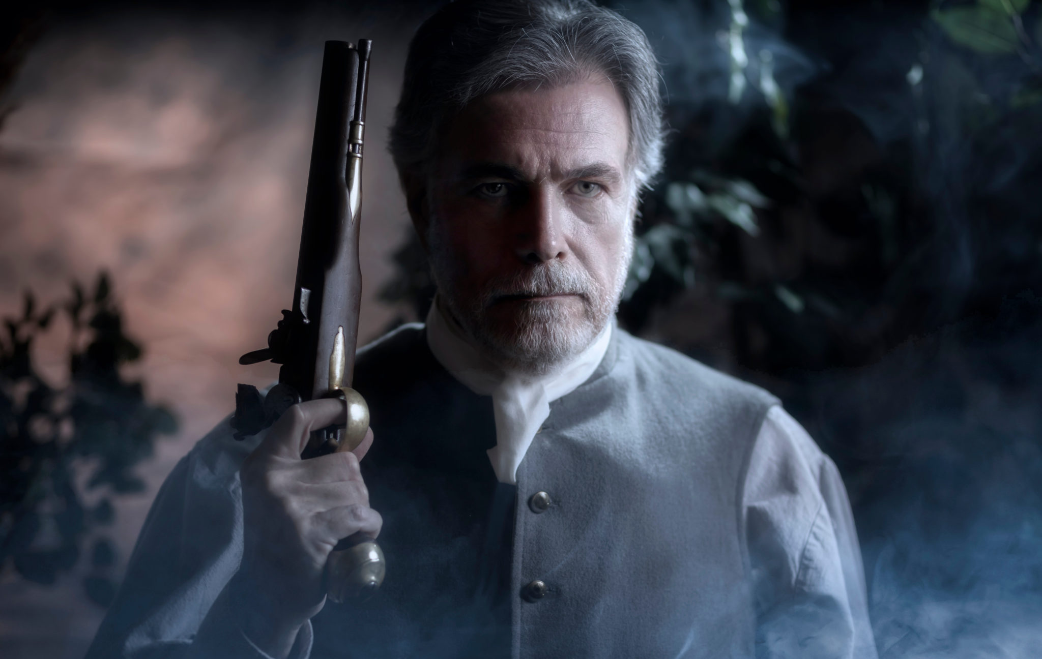 Man with flintlock pistol.