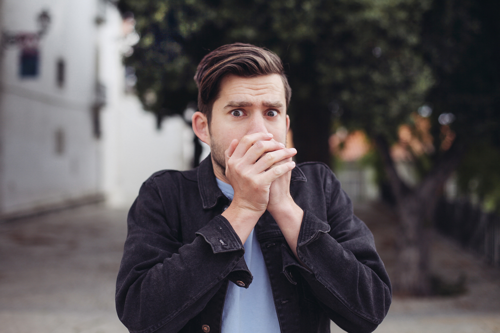 Young speechless man