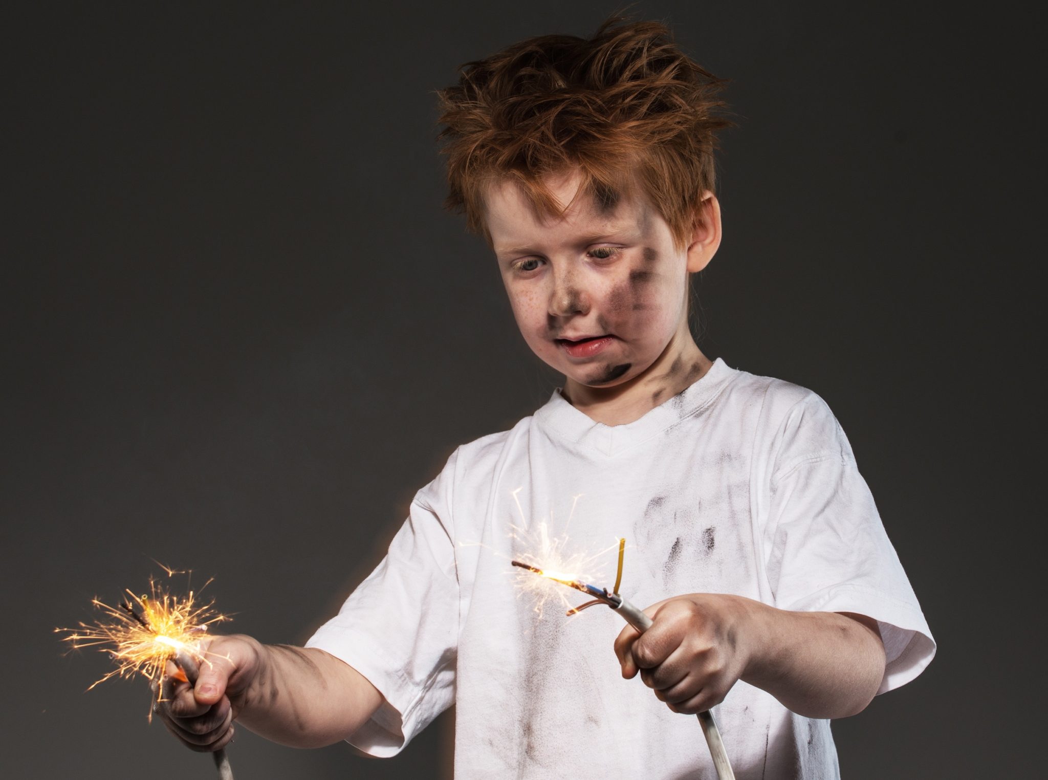 Little redhead bad boy with sparkling wires