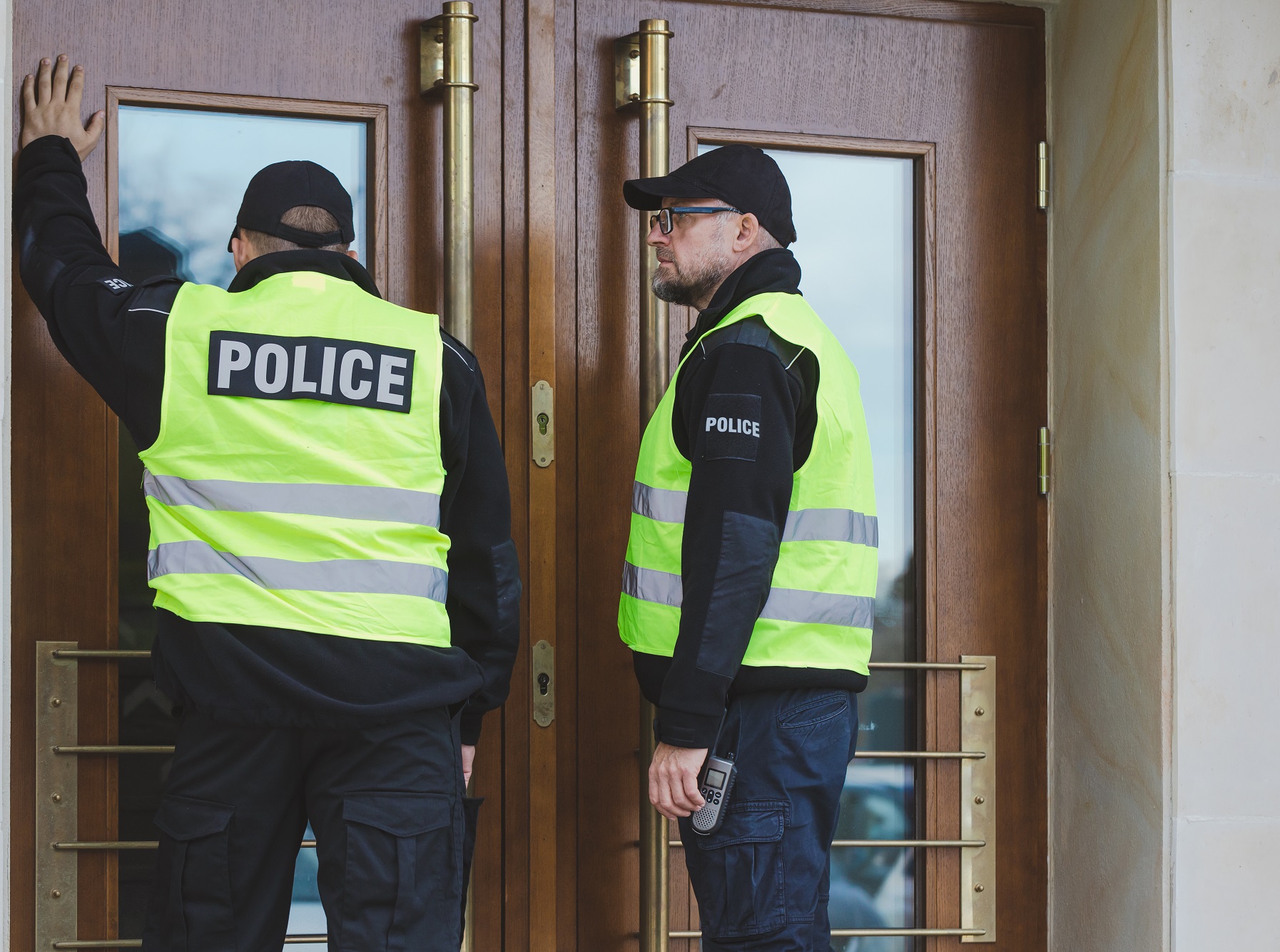 Two policemen at front door