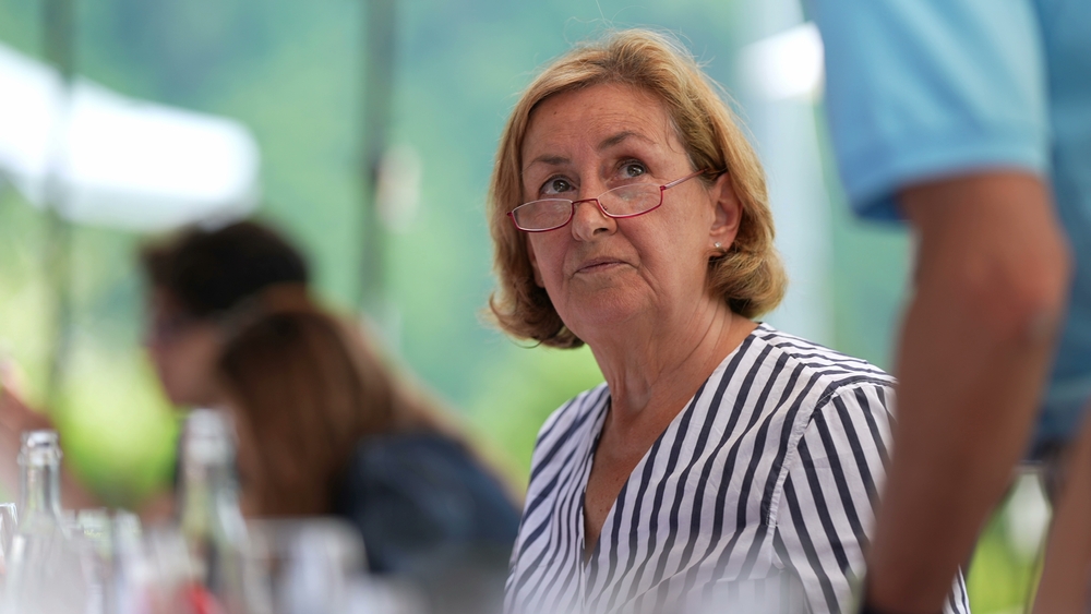 Older woman eating in restaurant