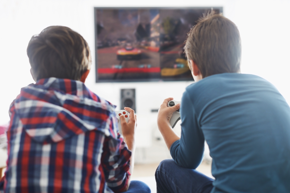 Two boys playing a video game