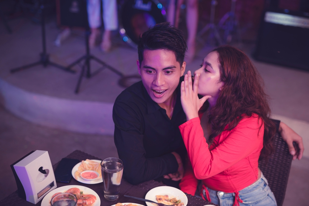 Shocked man by girlfriend words