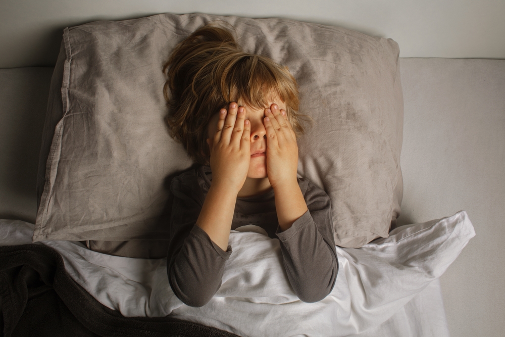 Little boy in bed had nightmares