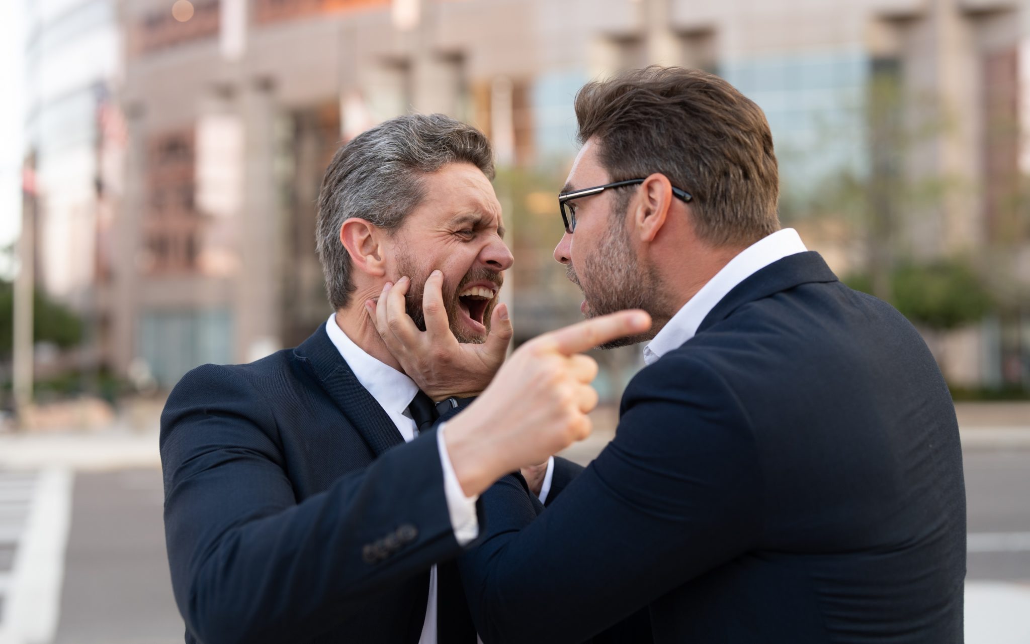 Two man fighting on the street