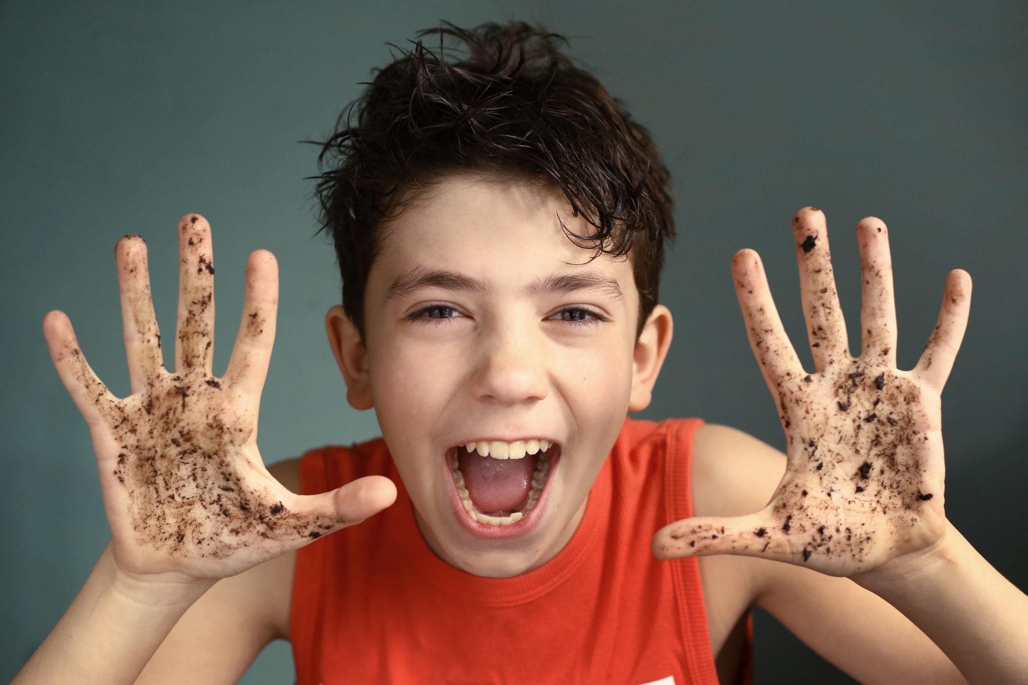 Boy with dirty hands