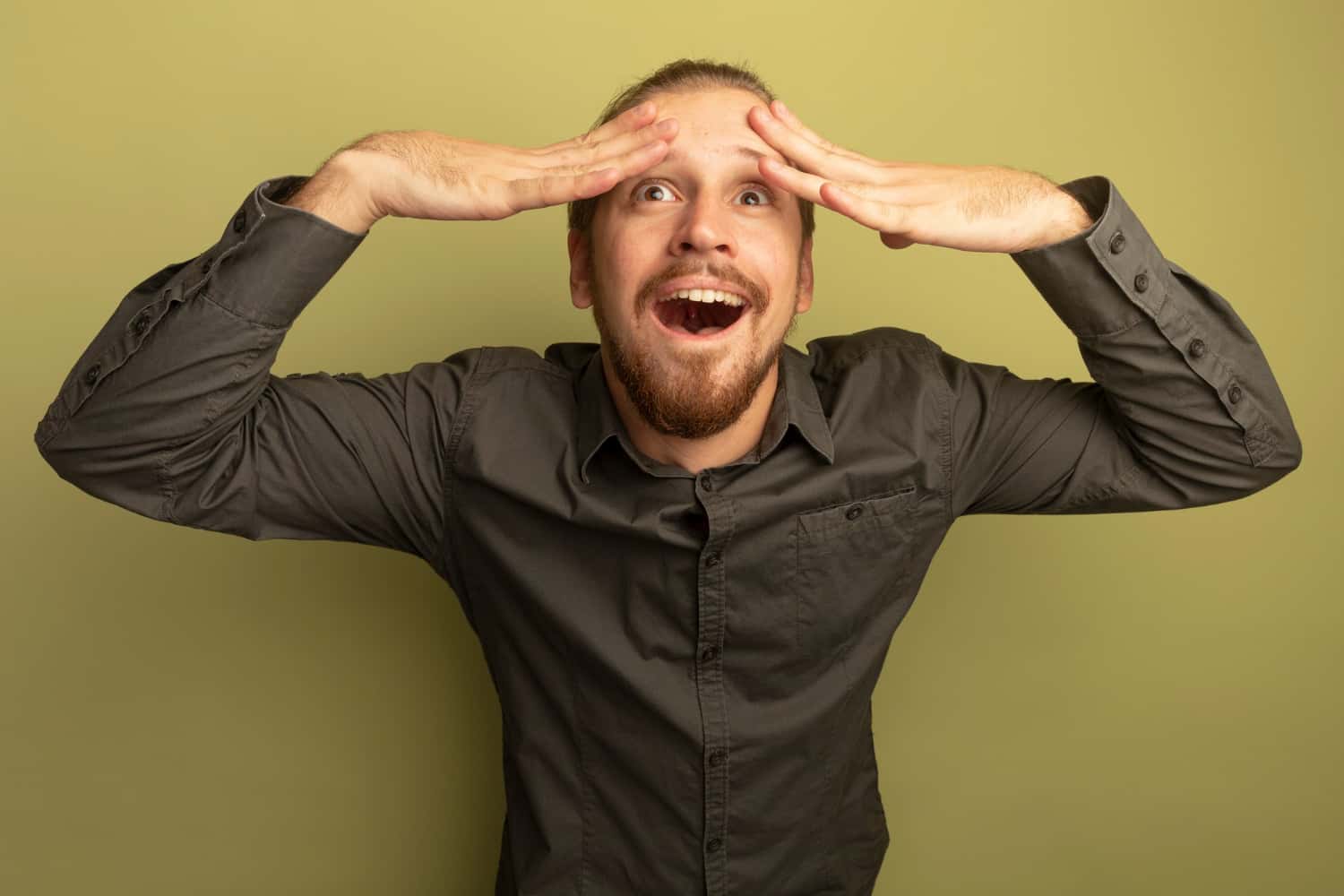 Surprised man in dark shirt