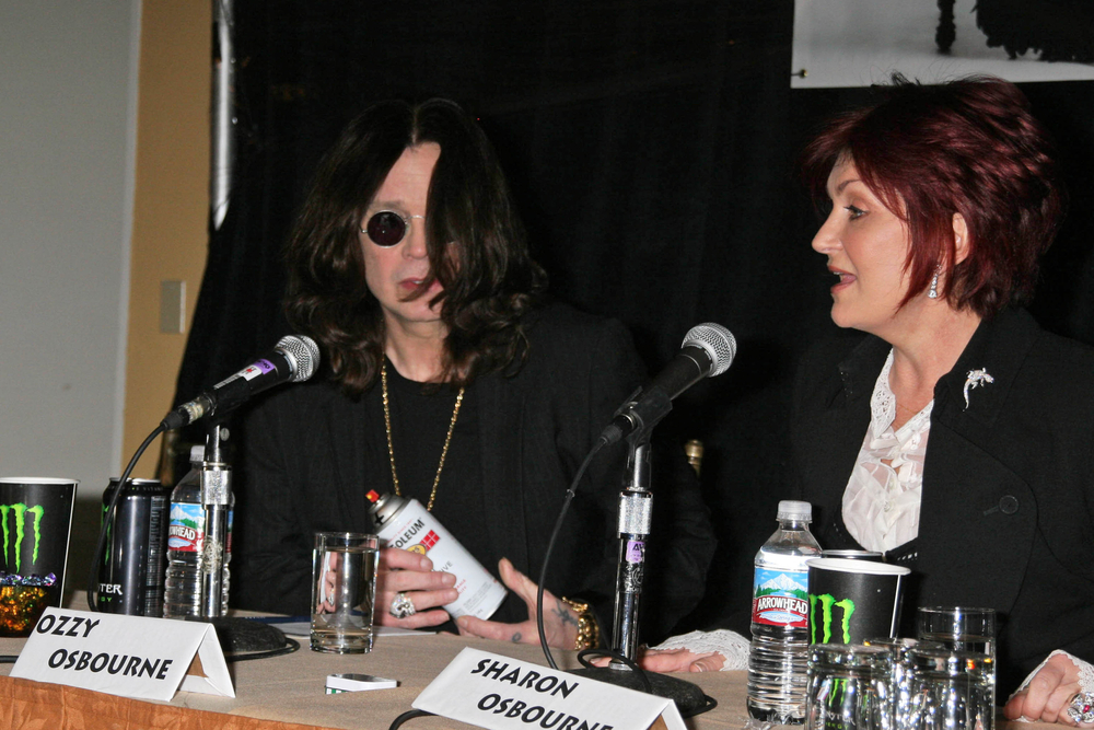 Ozzy Osbourne and Sharon Osbourne at the OZZFEST sitting next to each other with microphones in front