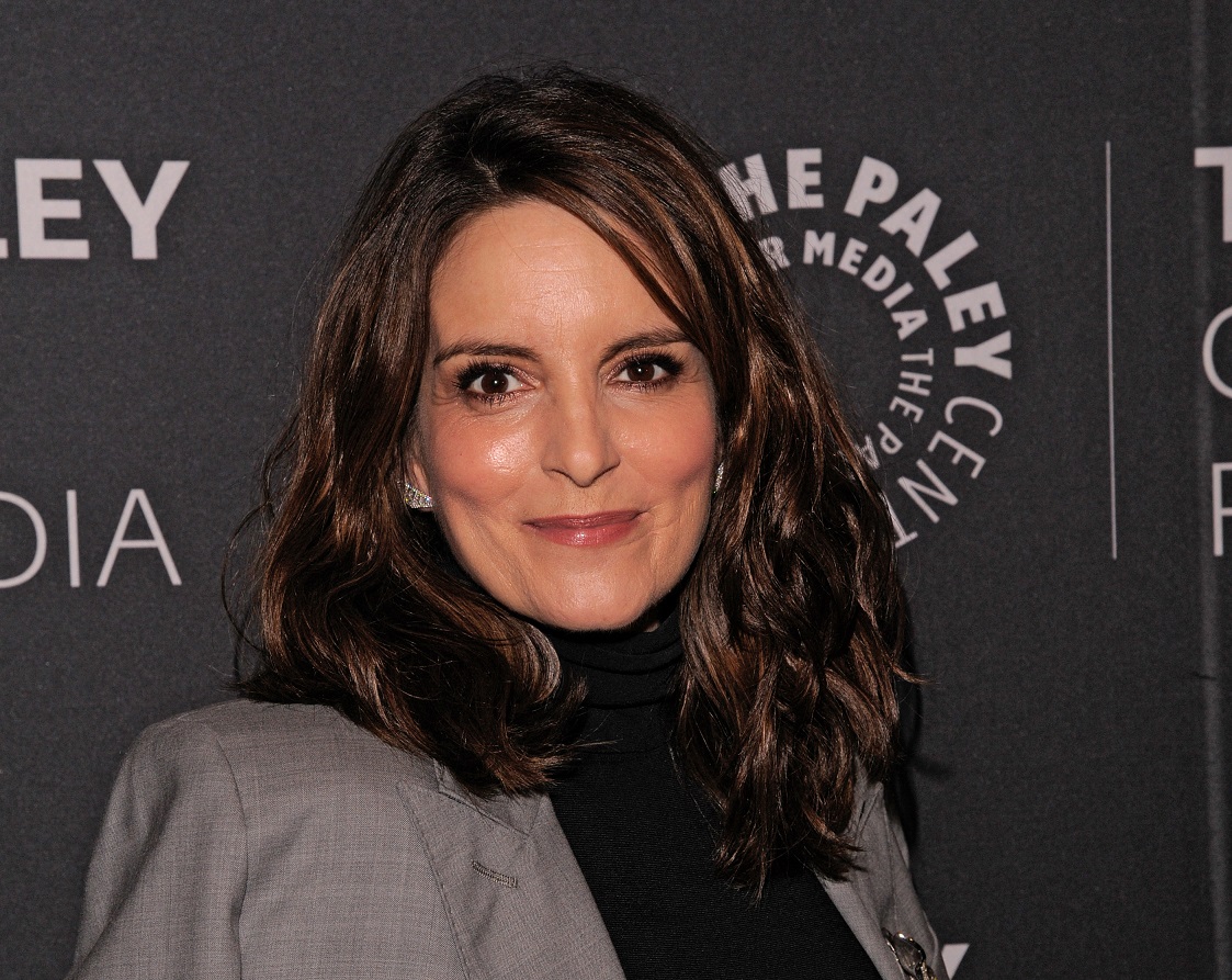 Tina Fey wearing grey suit is looking at camera - 2019