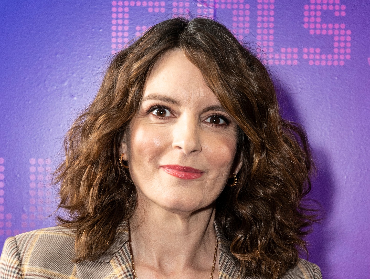 Tina Fey is looking at camera and smiling - 2022