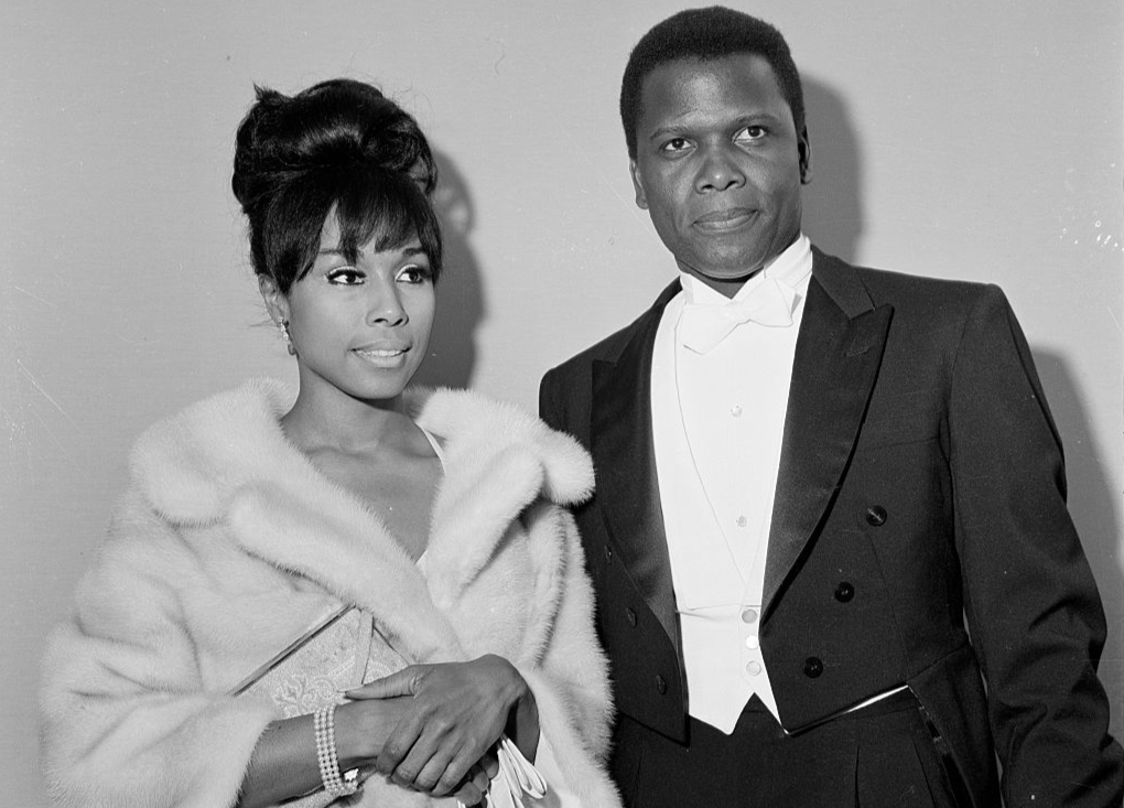 Actor Sidney Poitier with actress Diahann Carroll attend Academy Awards