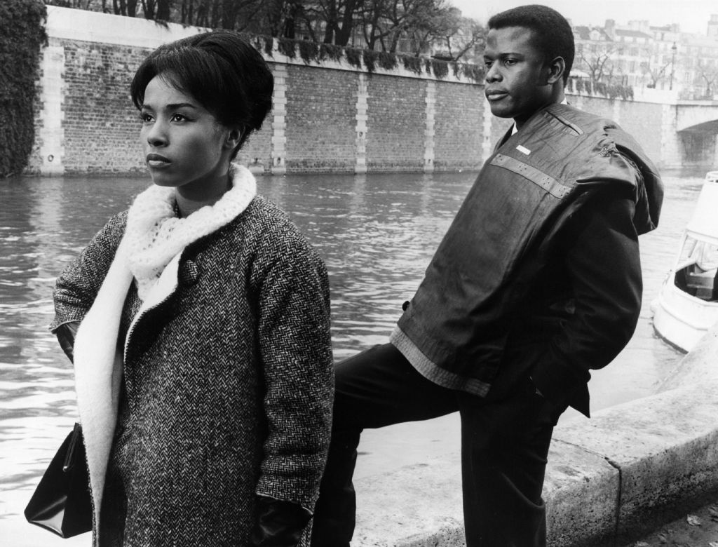 Grayscale photo of the Actress and Actor Diahann Carroll and Sidney Poitier