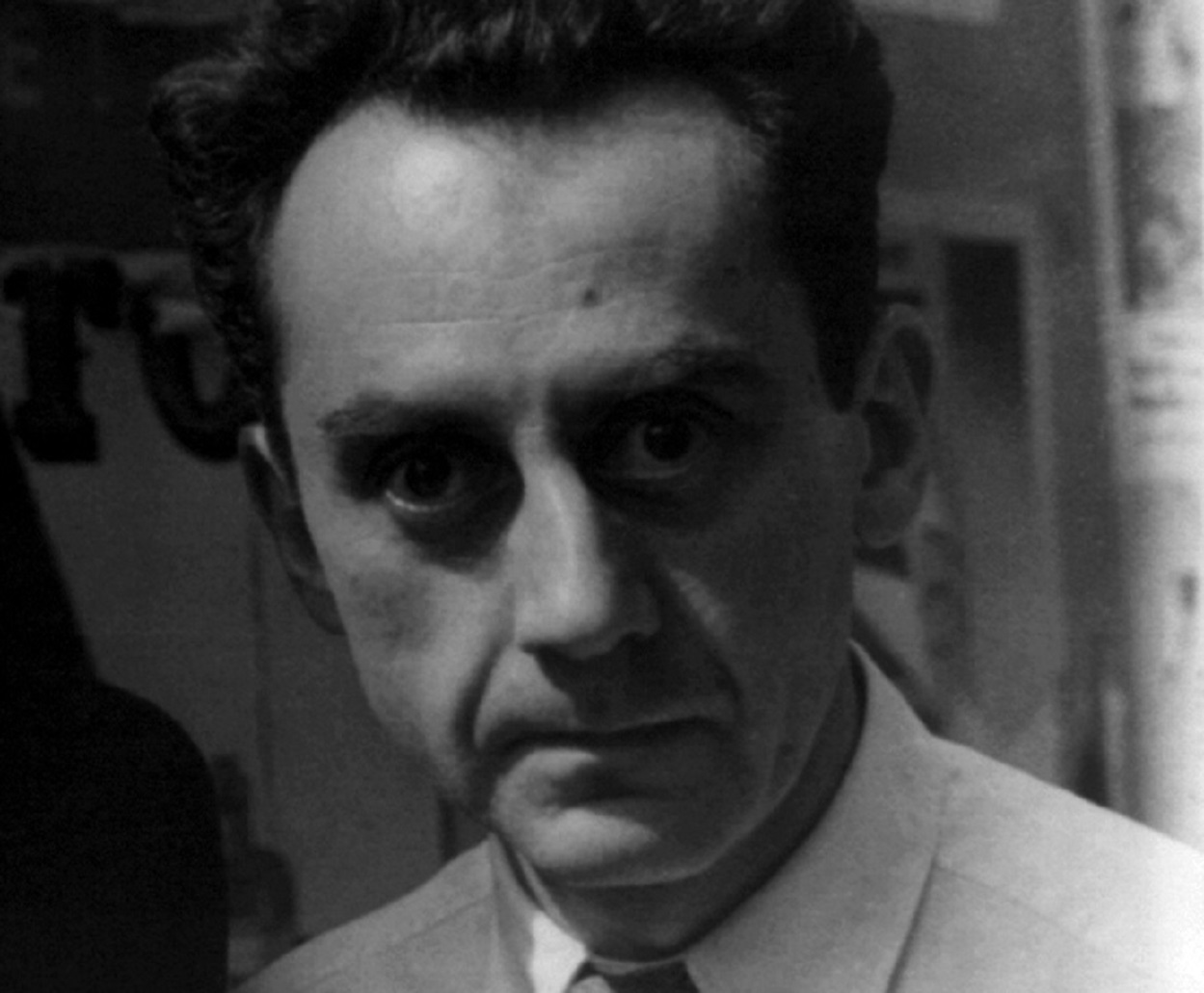 Portrait of Man Ray looking at camera - 1934
