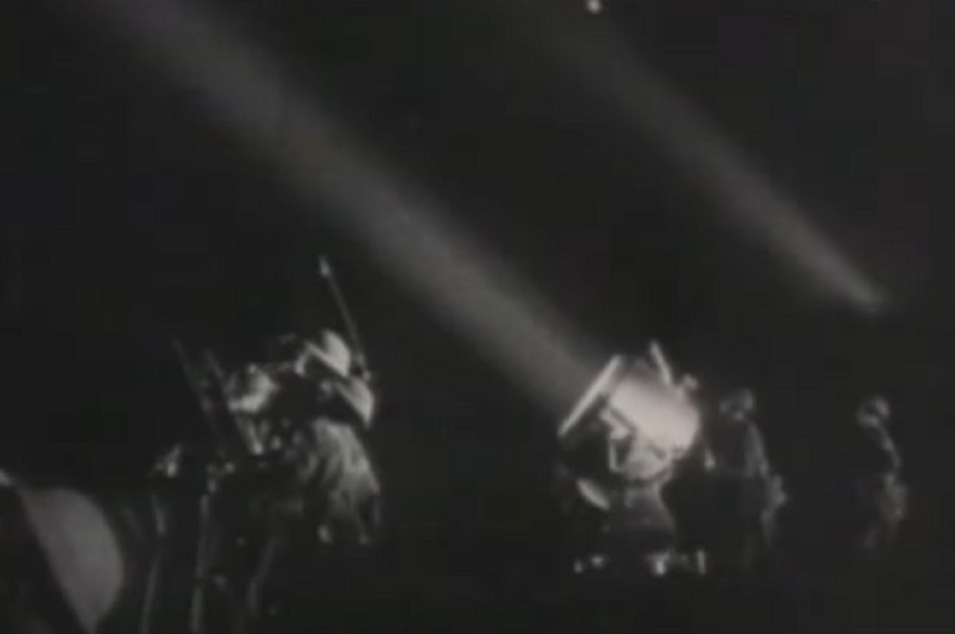 Screenshot :Military personal is turning lights on the sky in London attacks - from Lee Miller: Through the Mirror (1955)