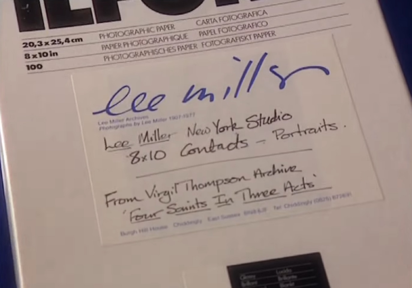 Screenshot of box full with pictures taken by Lee Miller - from Lee Miller- Through The Mirror (1995)