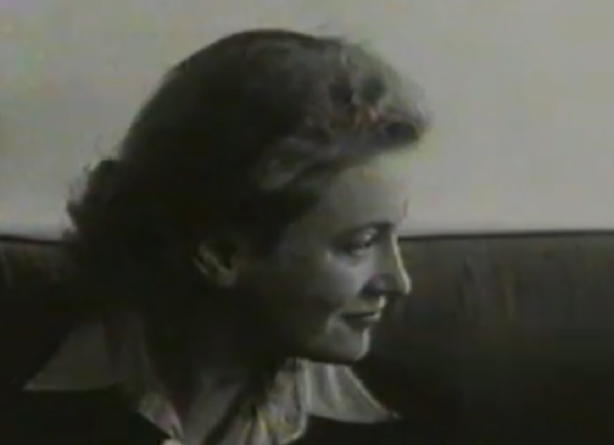 Screenshot: B&W Lee Miller is looking at front wearing white shirt - from Lee Miller: Through the Mirror (1955)