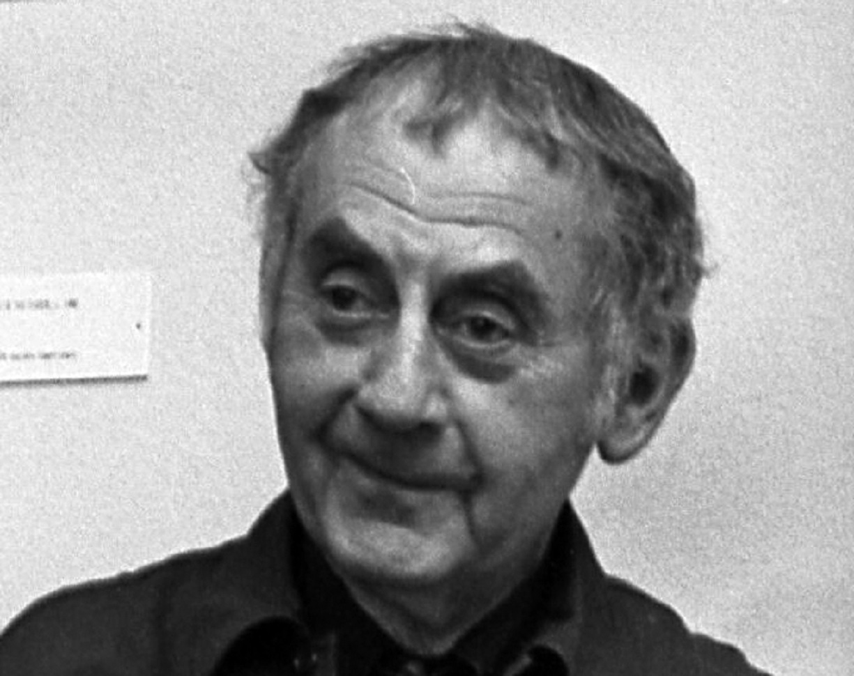 Man Ray wearing black shirt is looking at side - 1966