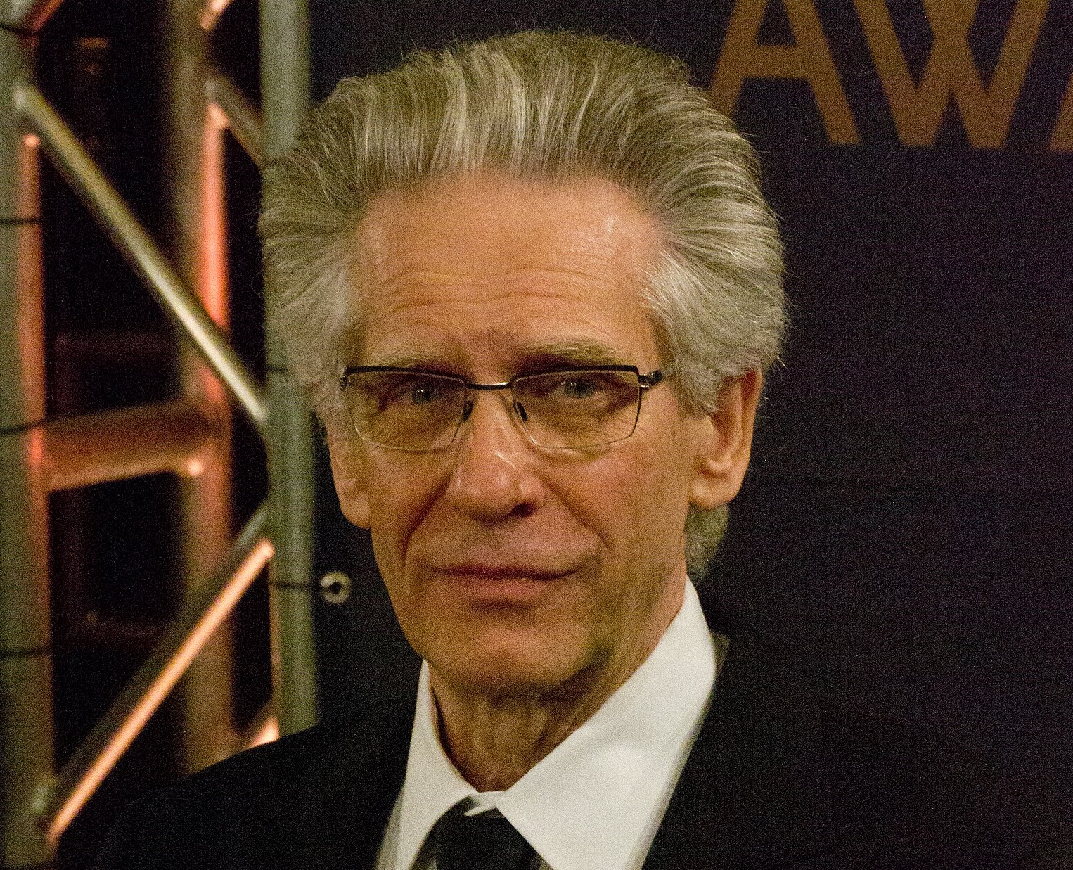 David Cronenberg wearing black suit is looking at camera - 2012