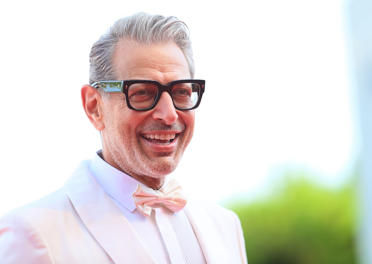 Jeff Goldblum wearing white suit is smiling - 2018