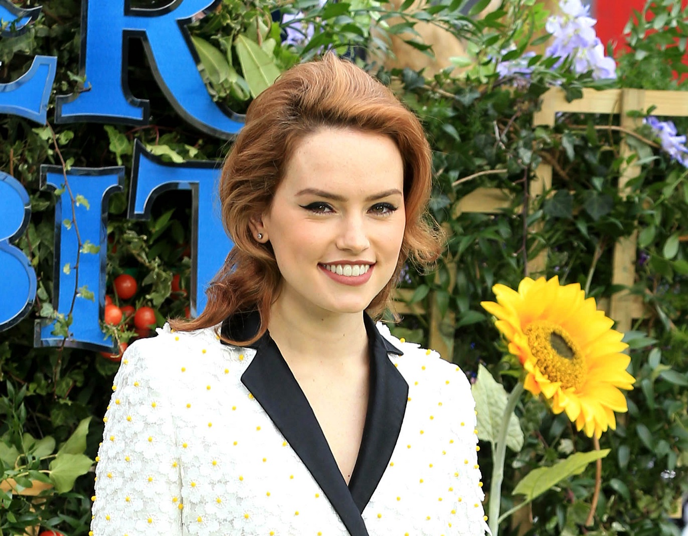 Daisy Ridley is smiling at camera - 2018