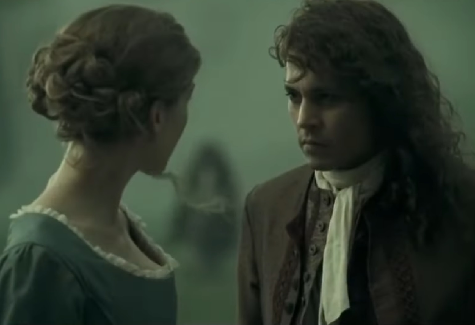 Screenshot: Johnny Deep and Rosamund Pike are looking at each other- from The Libertine (2004)