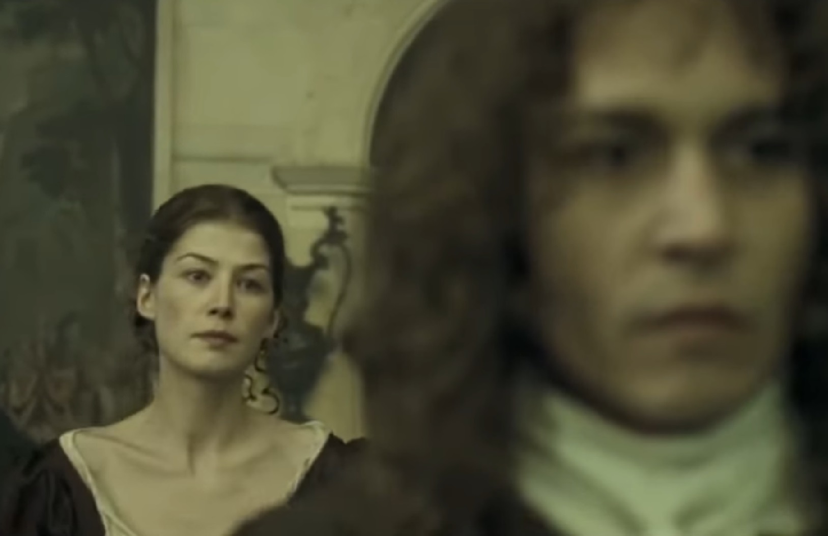 Screenshot: Johnny Deep and Rosamund Pike are looking at front - from The Libertine (2004)