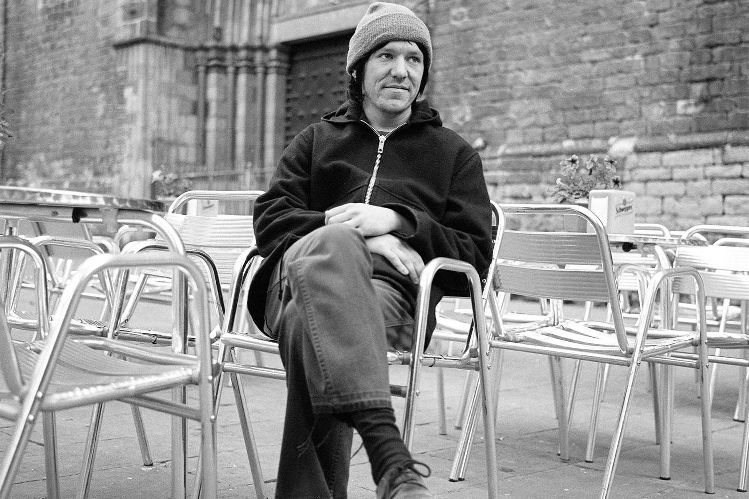 Elliott Smith Sitting Outside On A Patio