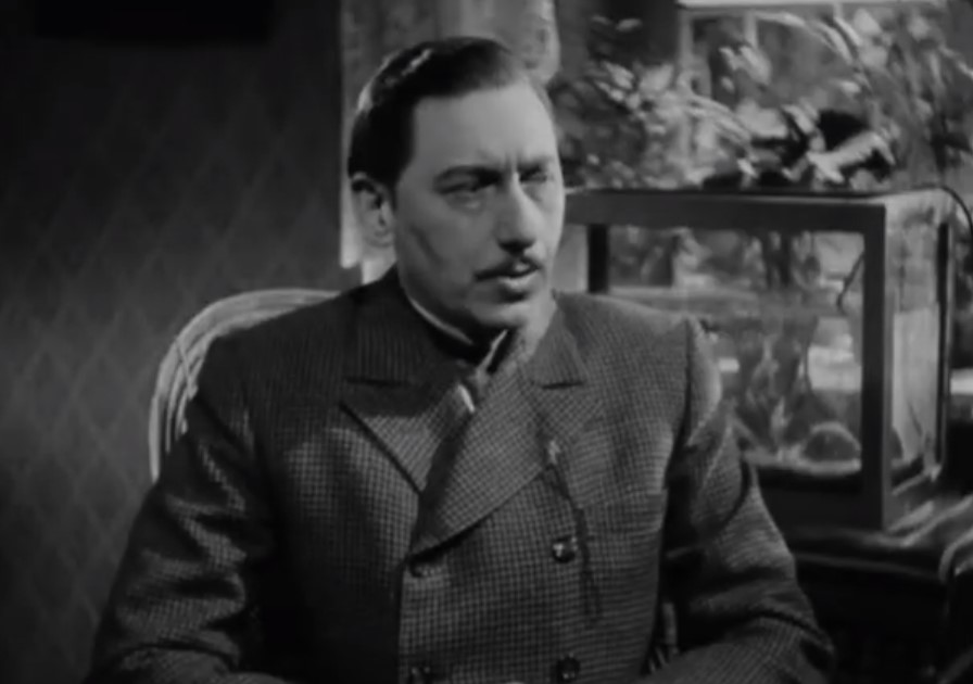 Willy Birgel  as diesel in movie in suit 