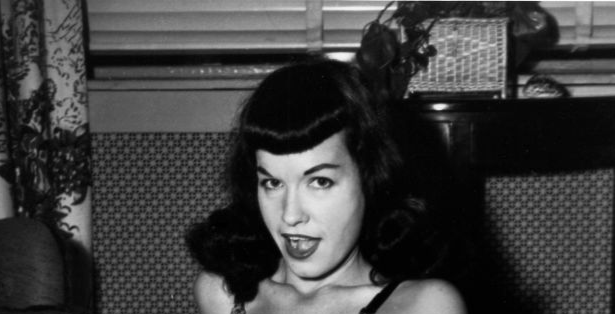 Pin-up model Bettie Page poses for a portrait
