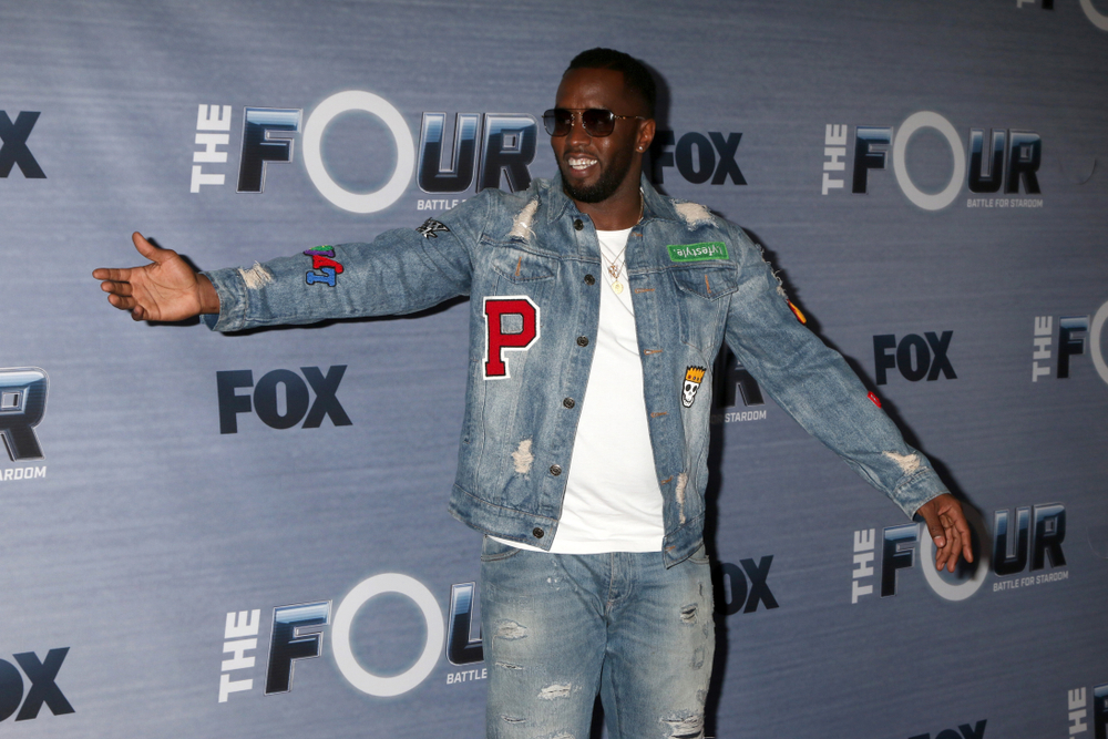 Sean Combs at the "The Four" Season 1 Finale Viewing Party wearing blue jeans jacket and a white t-shirt