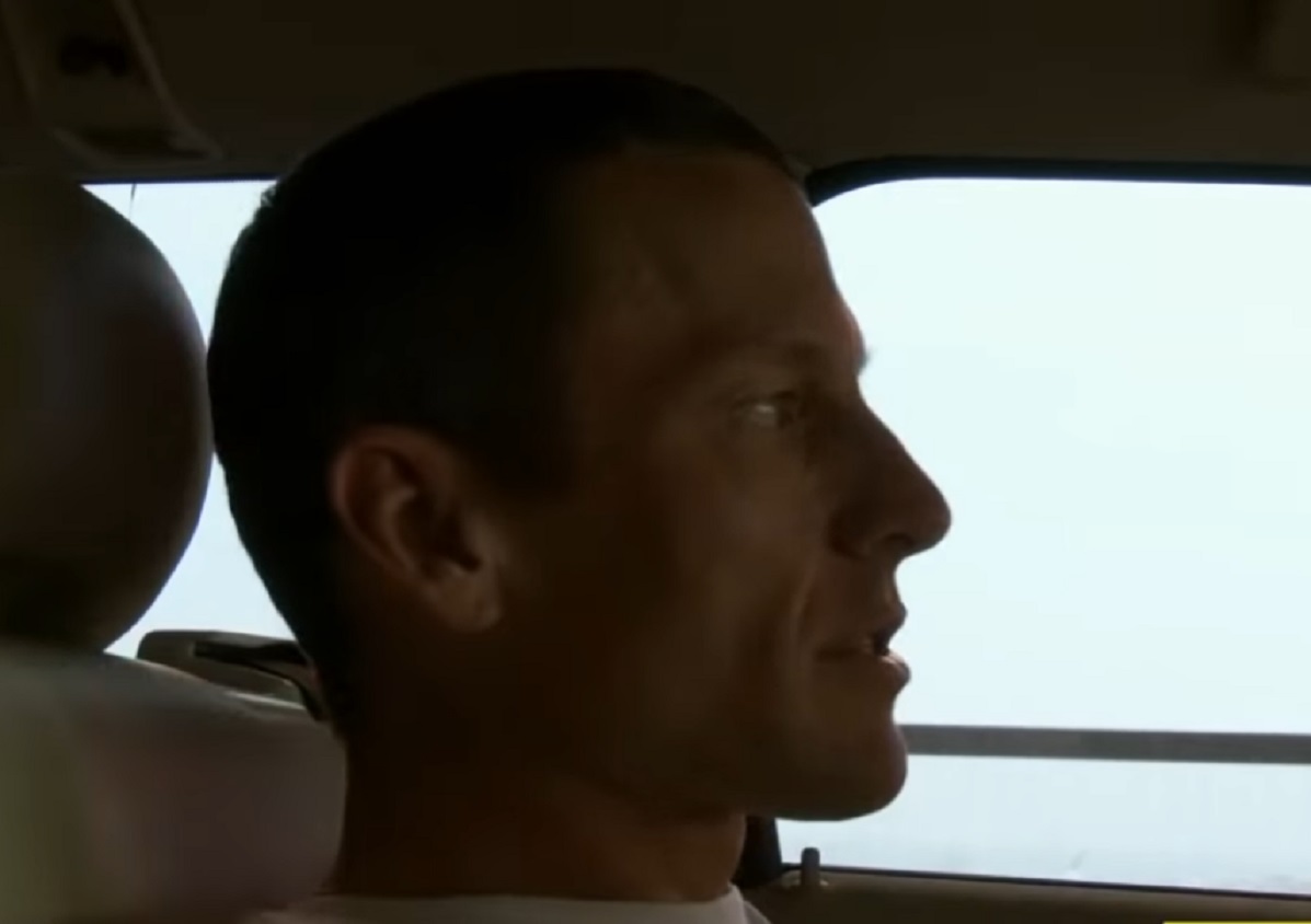 Screenshot: Lance Armstrong is driving a car - from Stop At Nothing- The Lance Armstrong Story (2014)