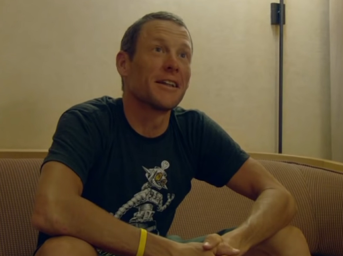 Lance Armstrong wearing is looking at side - from he Armstrong Lie (2013)
