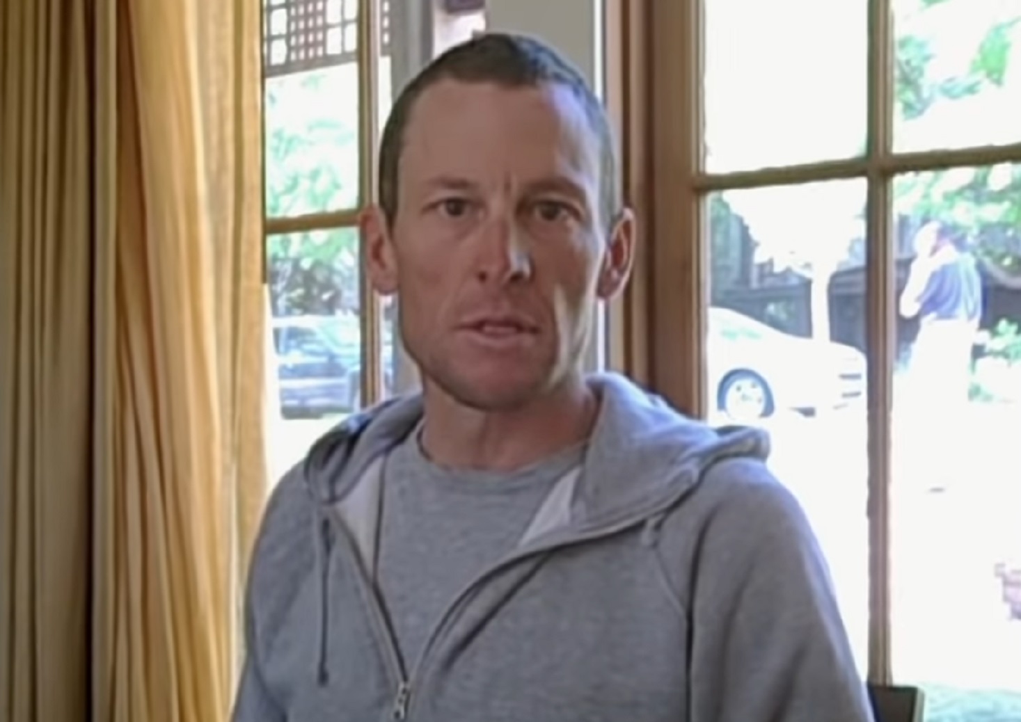 Screenshot: Lance Armstrong is looking at camera - from The Armstrong Lie (2013)
