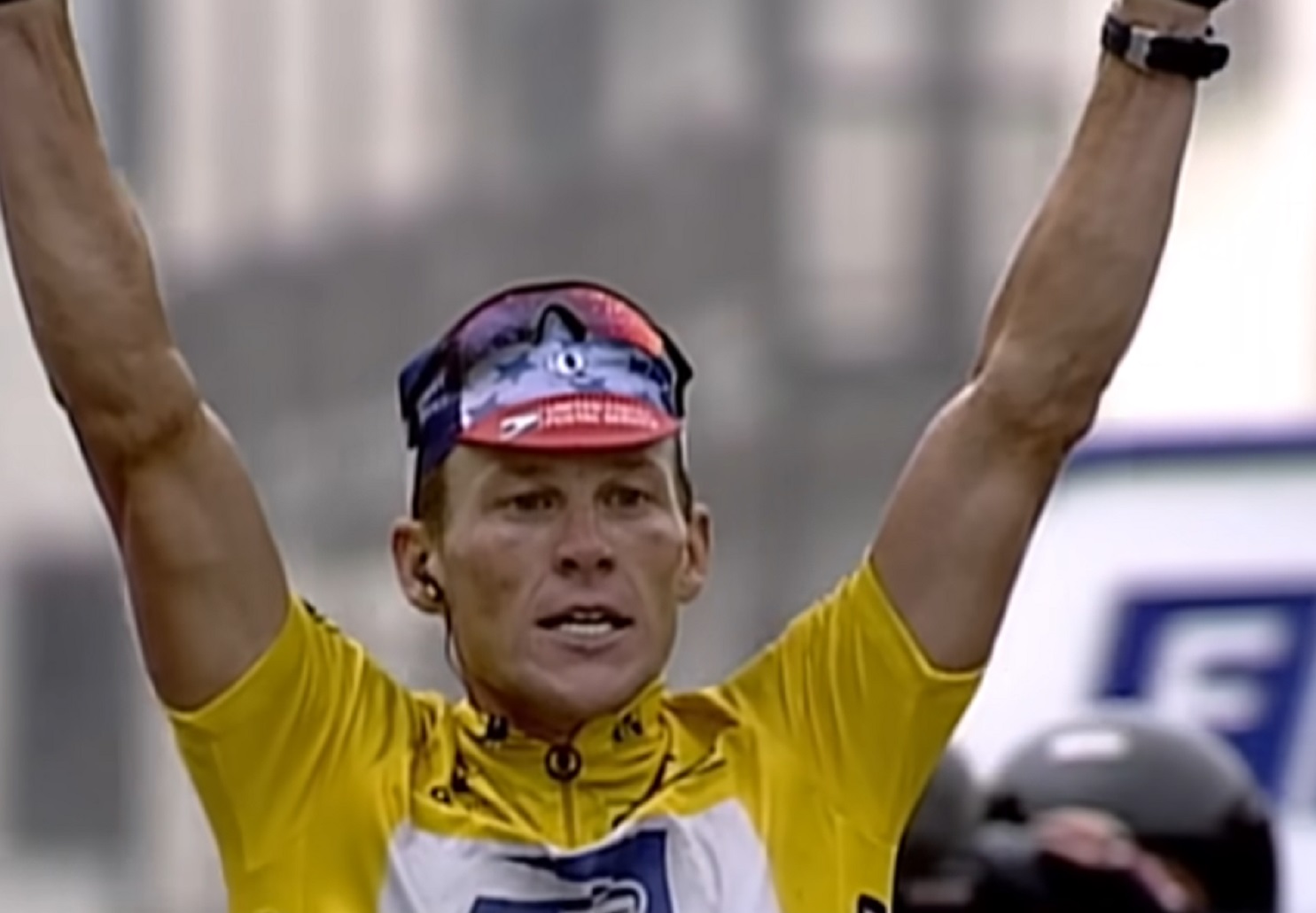 Lance Armstrong with hands in the air - from Stop At Nothing- The Lance Armstrong Story (2014)