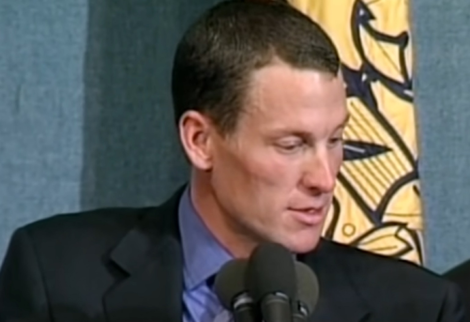 Screenshot: Lance Armstrong is looking at side - from Stop At Nothing- The Lance Armstrong Story (2014).