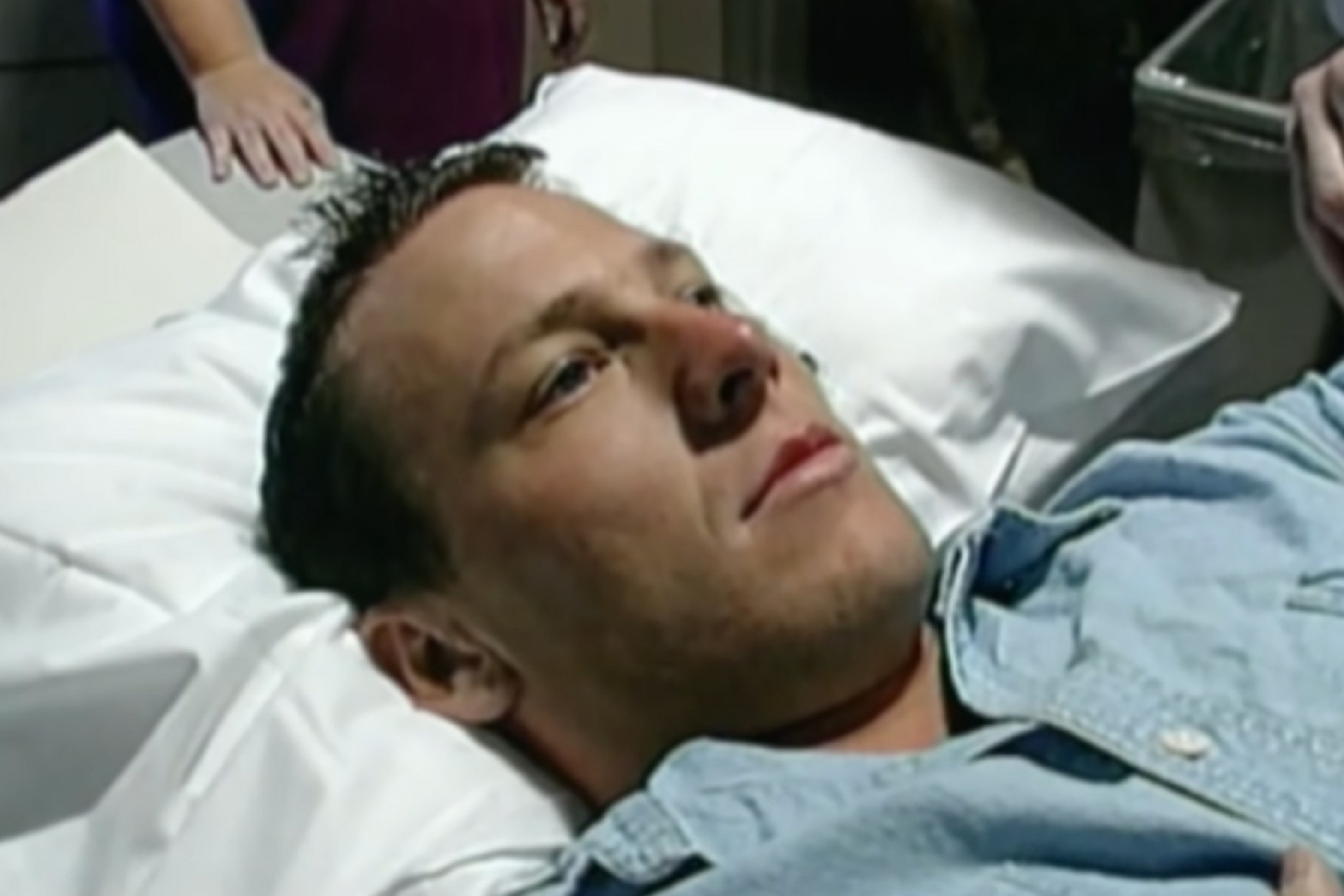 Screenshot: Lance Armstrong laying in hospital bed - from Stop At Nothing- The Lance Armstrong Story (2014).