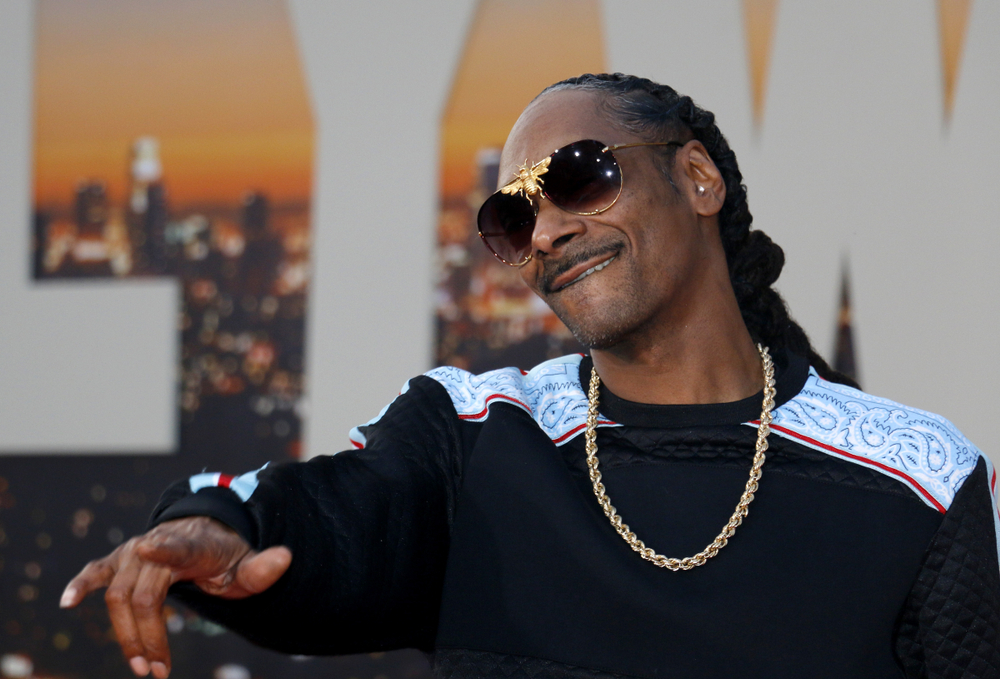 Snoop Dogg at the Los Angeles premiere of 'Once Upon a Time In Hollywood' with golden necklace