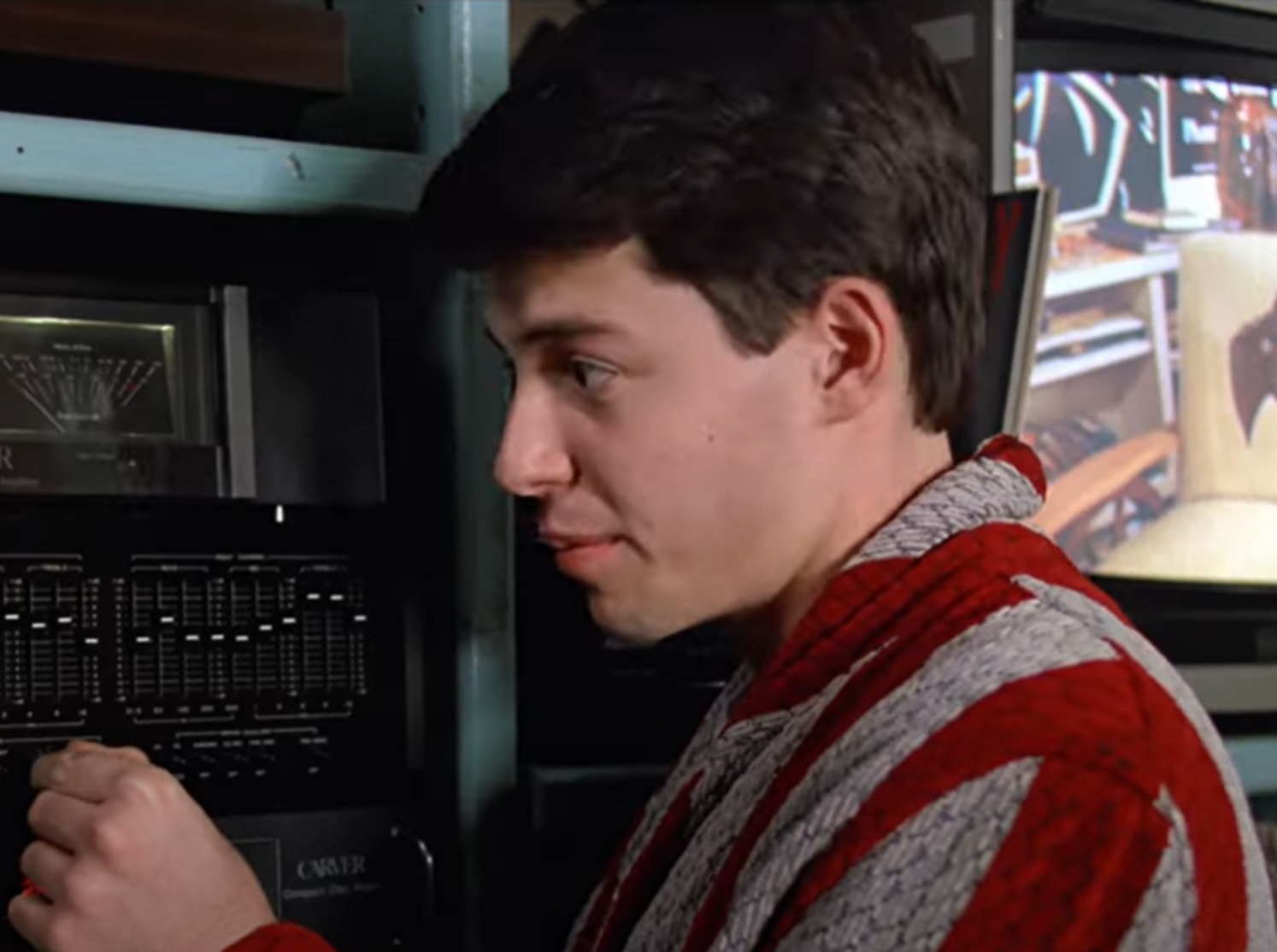 Screenshot: Matthew Broderick is looking at stereo - from Ferris Bueller's Day Off (1986)