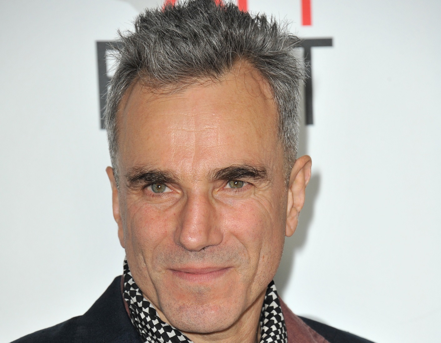 Daniel Day-Lewis looking at camera and smiling - 2012