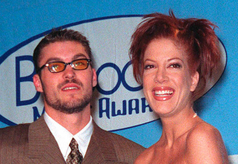 Tori Spelling At An Event In A Pink Shirt
