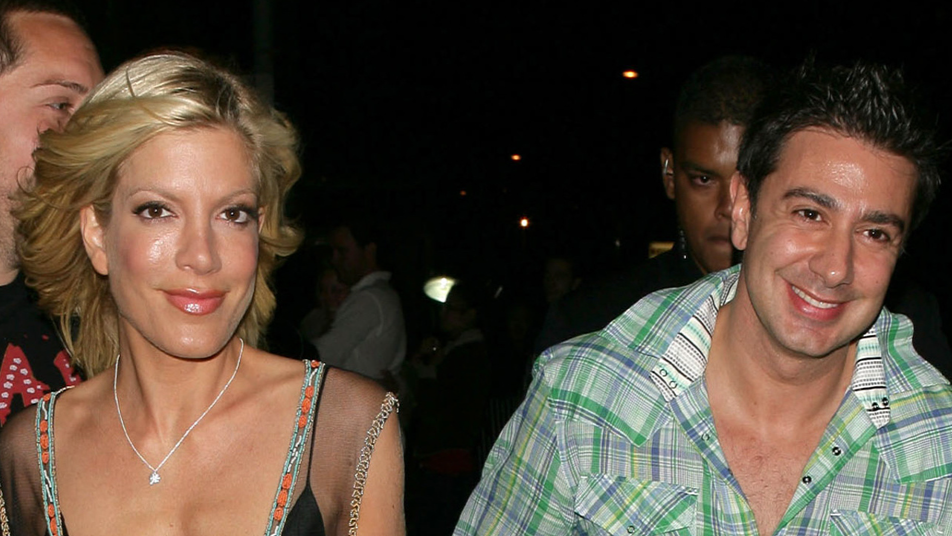 Tori Spelling At An Event In A Pink Shirt