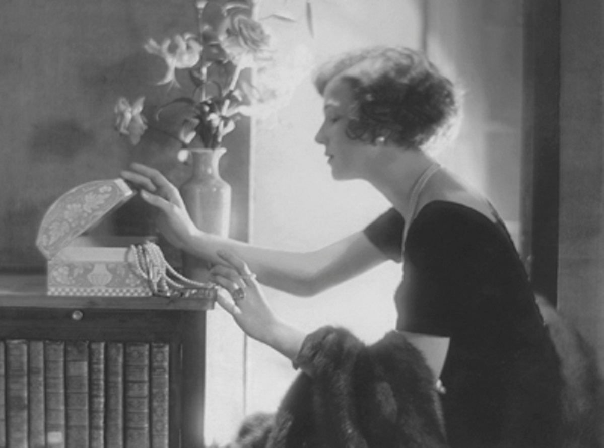 Irene Castle Treman wearing a black short-sleeved satin dress by Lucile (Lucy, Lady Duff Gordon) - 1921