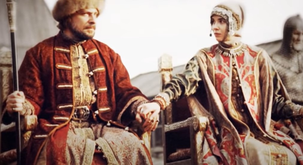 Ivan III of Russia and Mariya Andreeva as Sophia Palaiologina sitting on thrones 