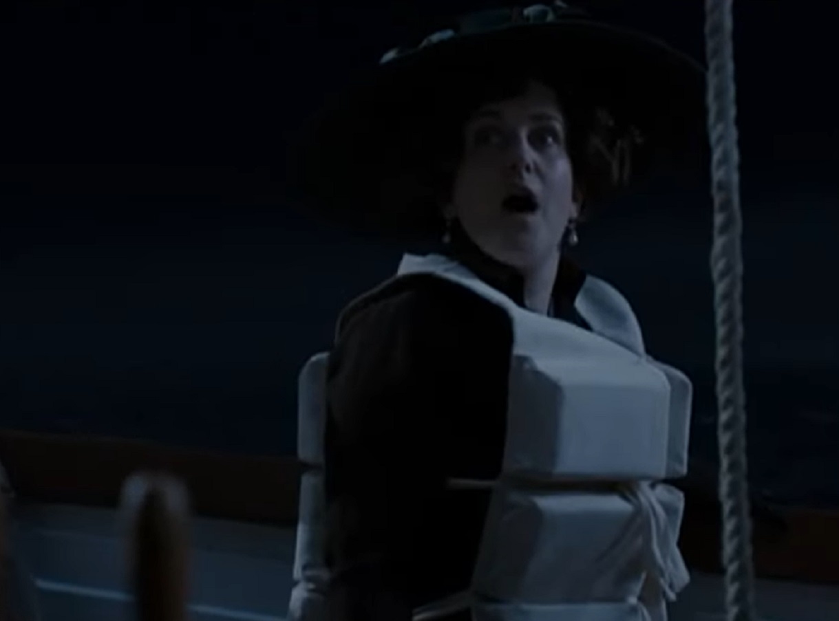 Screenshot: Lady Duff-Gordon is looking at side in the dark - from Titanic (Mini Series 2012)