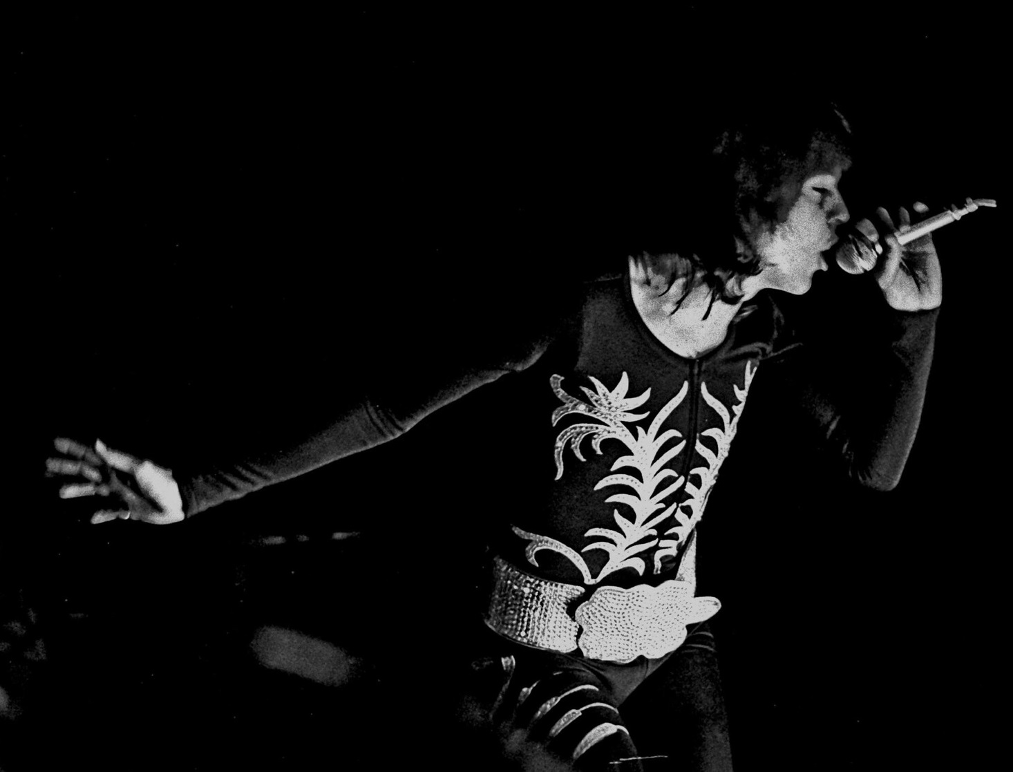 David Cassidy wearing black suit is performing on stage - 1972