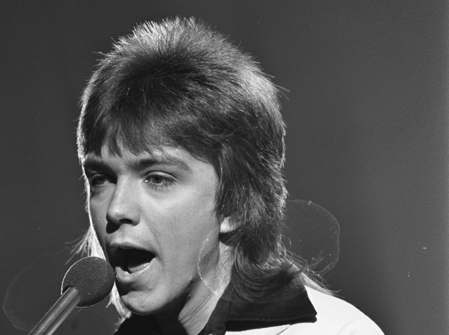 David Cassidy is performing on stage - 1975